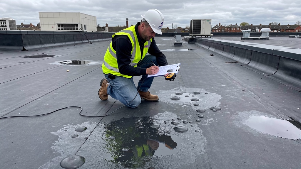 Flat roof survey inspection on UK commercial property