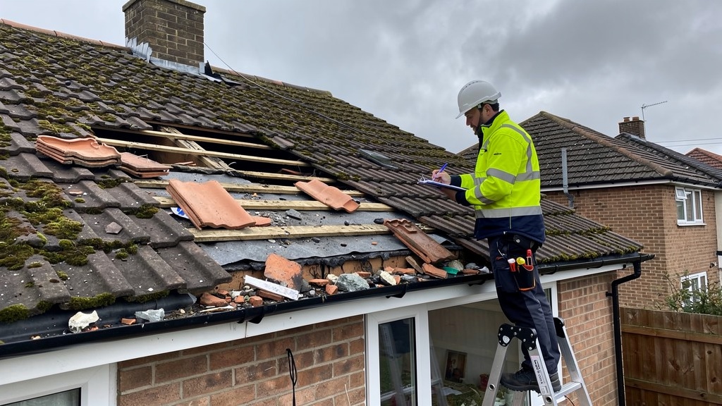 Insurance roof survey assessing storm damage on UK residential property